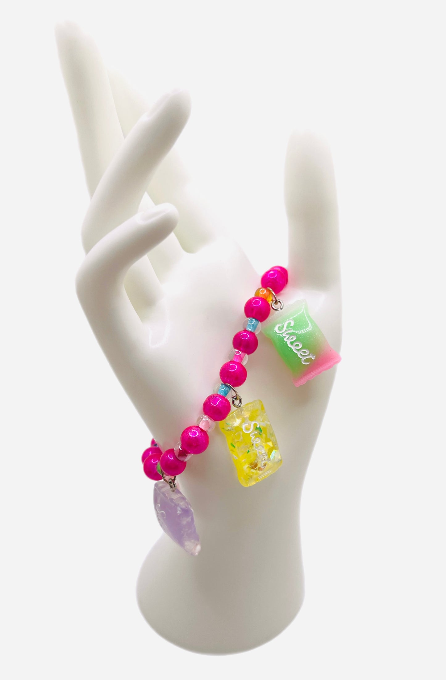 Hot pink beaded bracelet with pearls, sweet candy charms