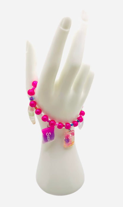 Hot pink beaded bracelet with pearls, sweet candy charms