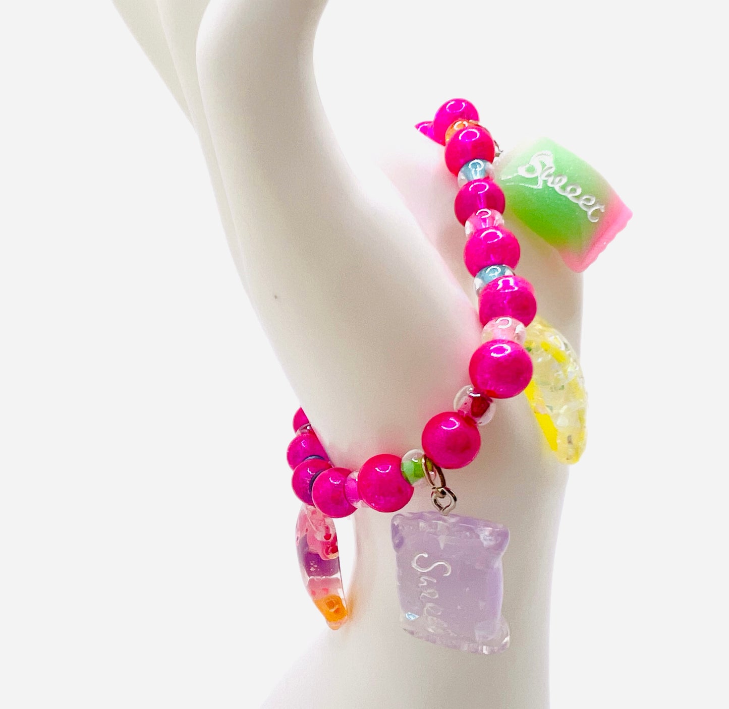 Hot pink beaded bracelet with pearls, sweet candy charms